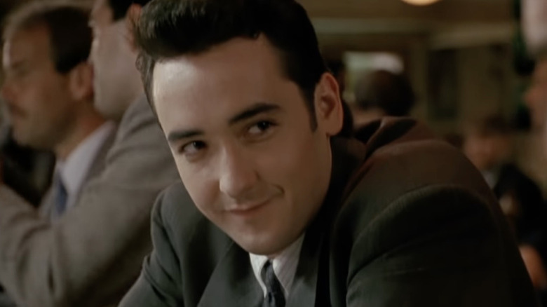John Cusack smiles