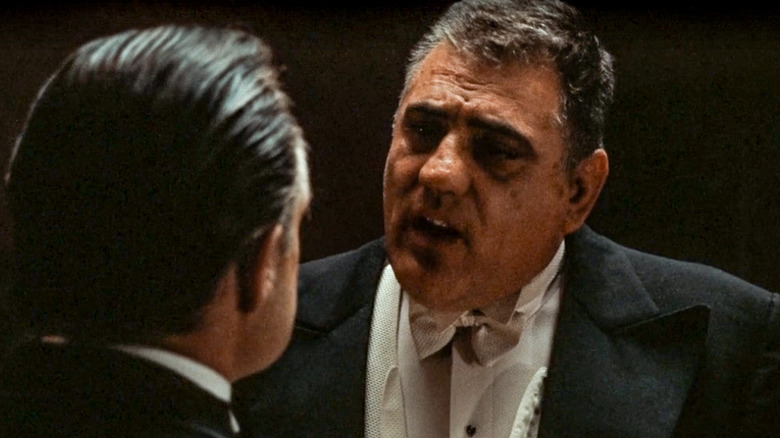 Luca Brasi talking to Vito Corleone