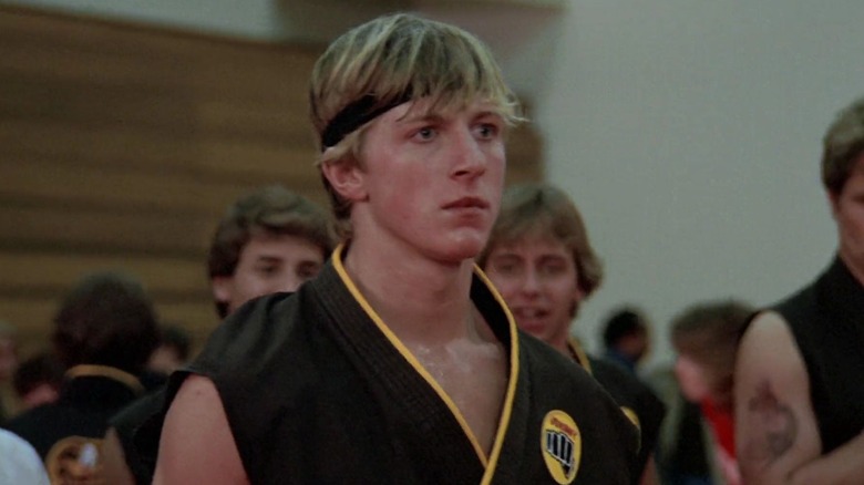Johnny Lawrence facing Daniel LaRusso