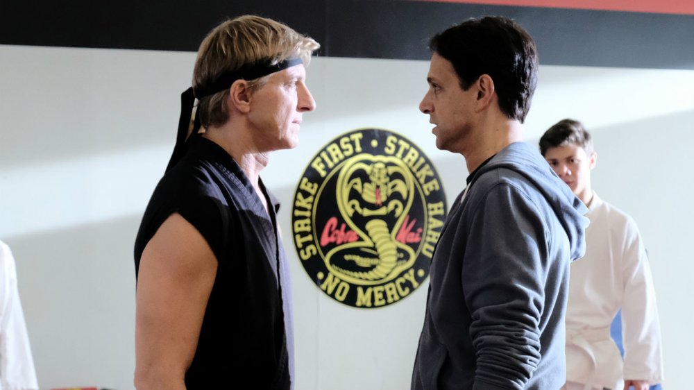 Billy Zabka as Johnny Lawrence and Ralph Macchio as Daniel LaRusso on Cobra Kai