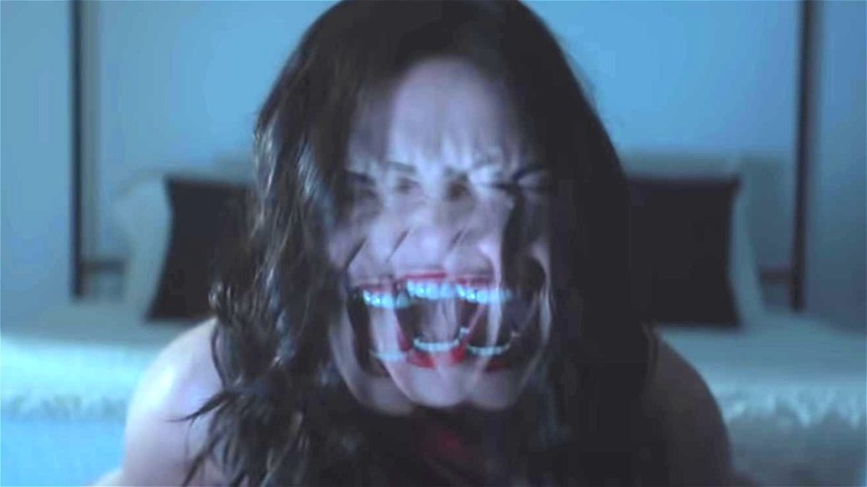 Kate Siegel's screaming face distorted in Hypnotic