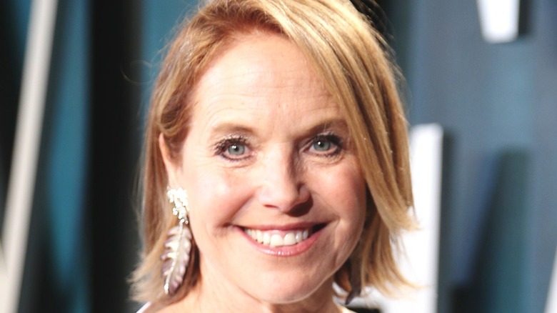 Katie Couric smiles on red carpet