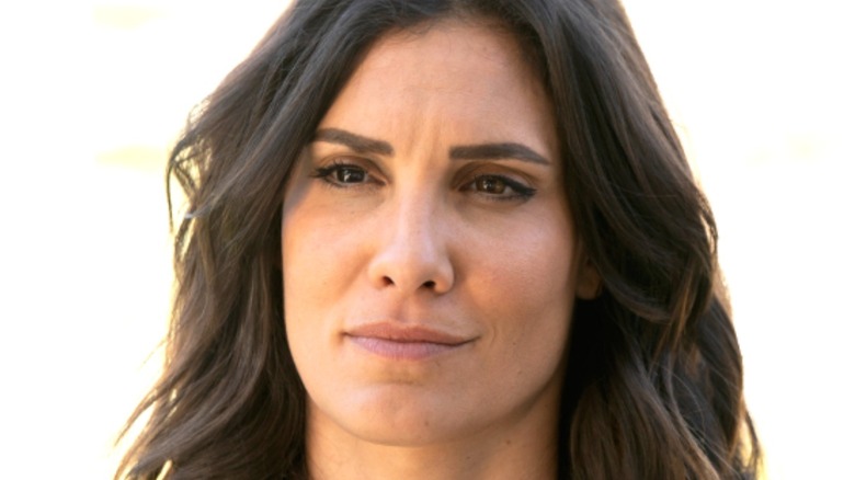 Kensi with a smirk on her face