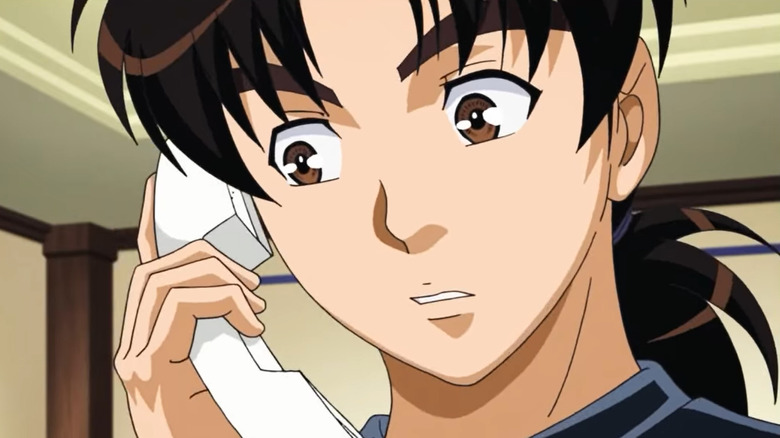 Hajime Kindaichi on phone