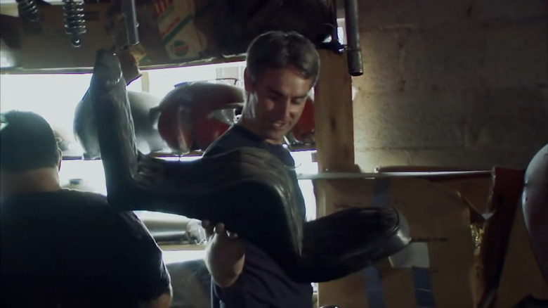 Mike Wolfe with motorcycle seat