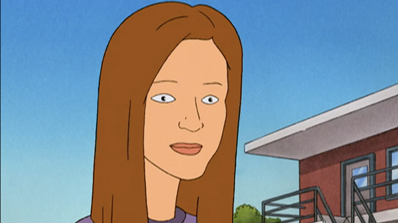 April wearing a purple shirt