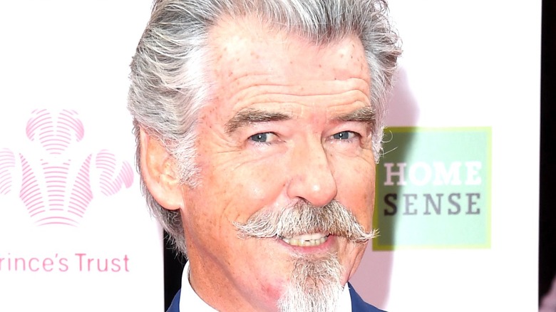 Pierce Brosnan grinning