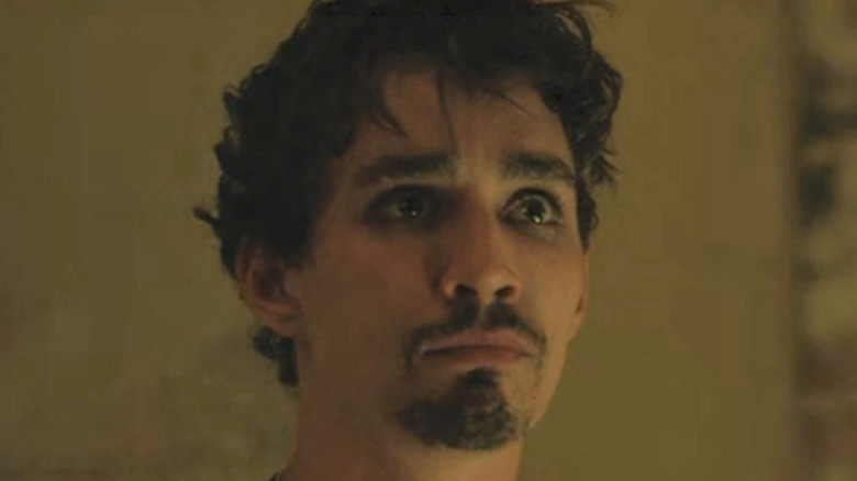 Robert Sheehan looking sad as Klaus Hargreeves