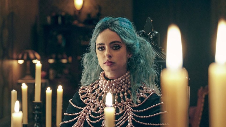 Krysten Ritter playing a witch