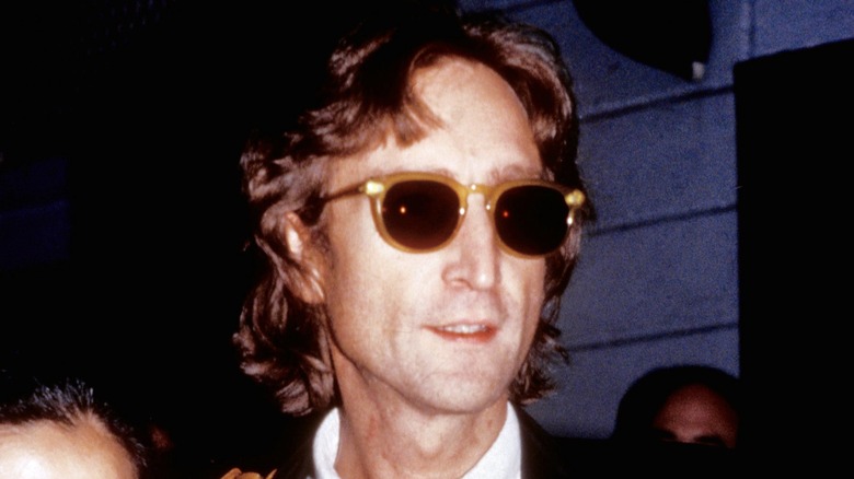 John Lennon in sunglasses at night