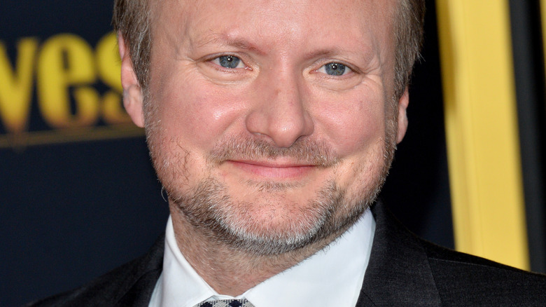 Rian Johnson smiles