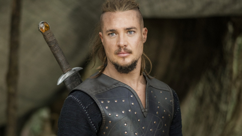 A smiling Uhtred on a horse