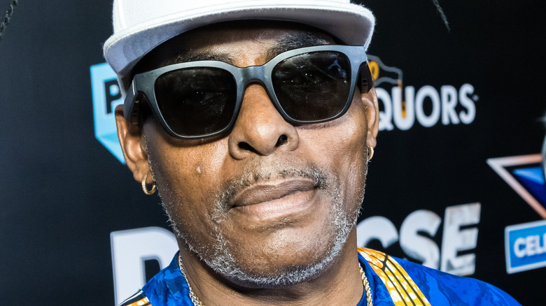 Coolio smiling at an event