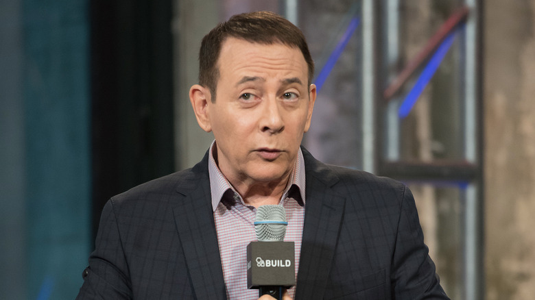 Paul Reubens talking in microphone