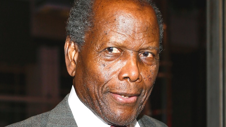Sidney Poitier in a grey suit