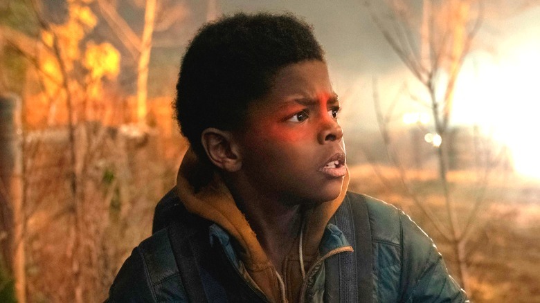 Sam looking worried and to his left on The Last of Us