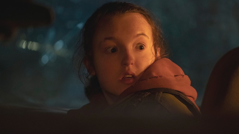 Bella Ramsey as Ellie in The Last of Us looking scared