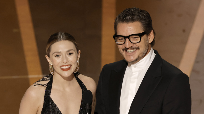 Elizabeth Olsen and Pedro Pascal smiling