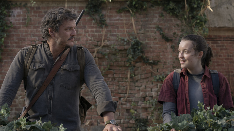 Joel looking at Ellie