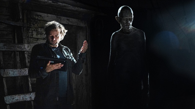 Øvredal and Botet stand on the set