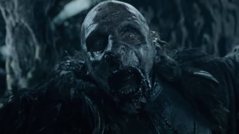 Grishnákh notices something "tree-ish" behind him