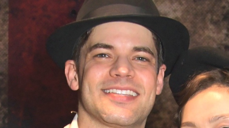 Jeremy Jordan wearing a fedora