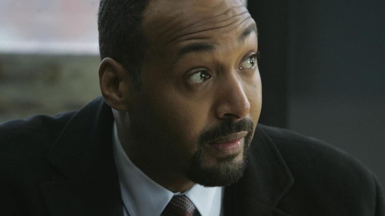 Law and Order Jesse L. Martin looks to the right as Ed Green