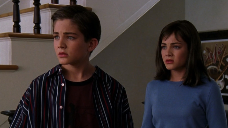 Reiley McClendon plays Logan Stanton and Lindsay Stanton