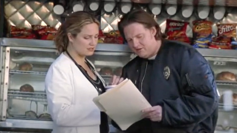 Susan and Chuck reading papers