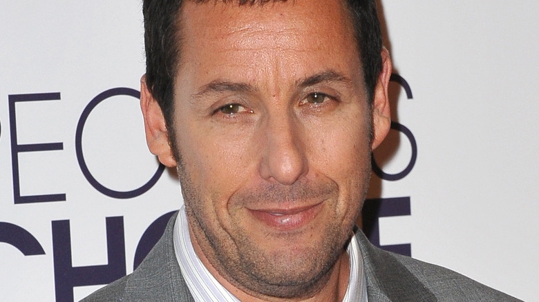 Adam Sandler smirking