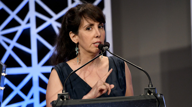 Dailyn Rodriguez speaking at an awards ceremony