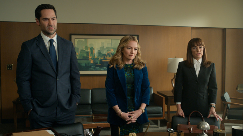 Mickey, Lorna and Dana stand resolutely in an office in "The Lincoln Lawyer"