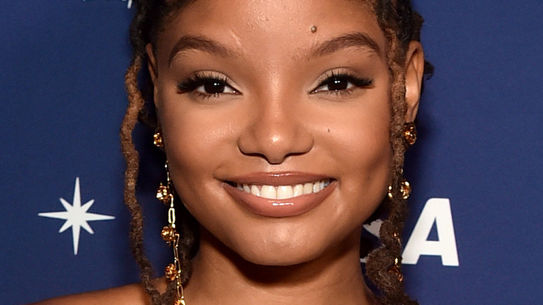 Halle Bailey blue background