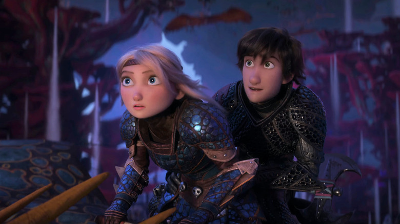 Astrid and Hiccup ride a dragon together