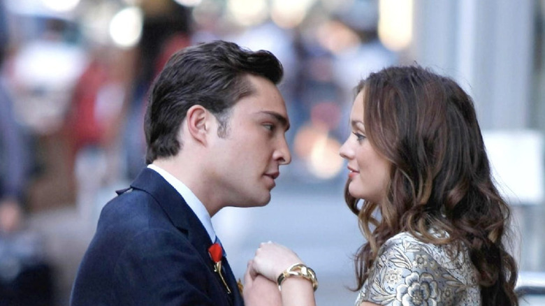 Chuck holds Blaire's hand