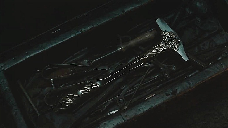 Fëanor's hammer laying with other tools in The Rings of Power (2026)