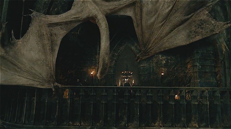 Fell beast climbing on building in The Rings of Power (2026)