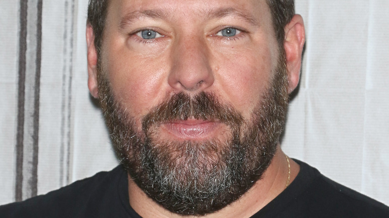 Bert Kreischer at event smiling