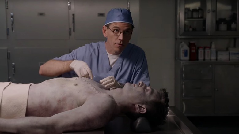 Mortician working on a body in NCIS 