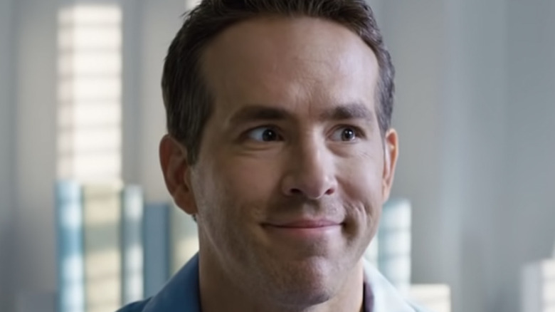 Ryan Reynolds smiling in Free Guy 