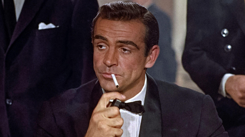 Sean Connery smokes as James Bond
