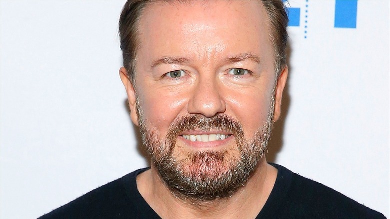 Gervais smiling for press photo