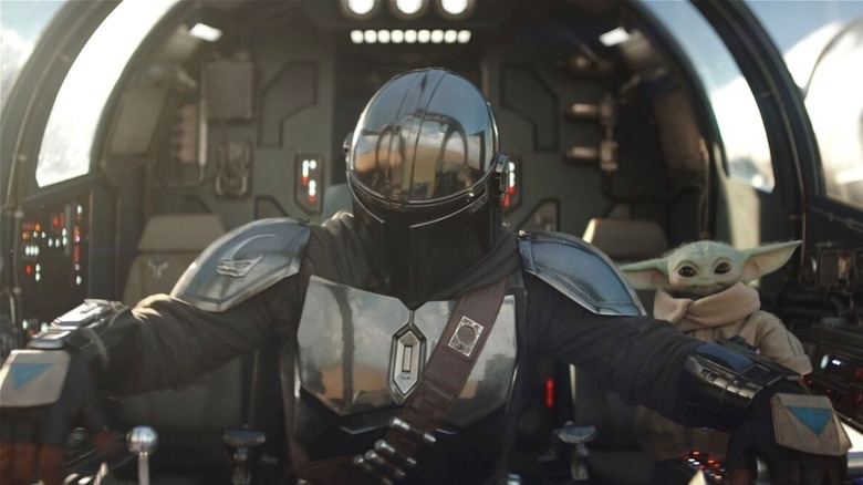 Din Djarin and Grogu sitting in ship in The Mandalorian and Grogu (2026)