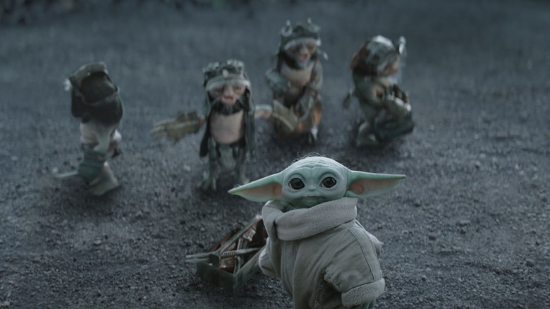 Grogu standing in front of Anzellans in "The Mandalorian and Grogu" (2026)