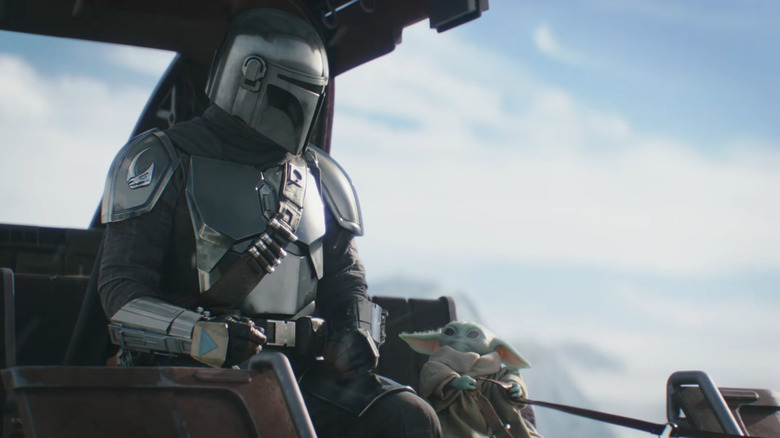 Din Djarin and Grogu share a look in a trailer for "The Mandalorian and Grogu"