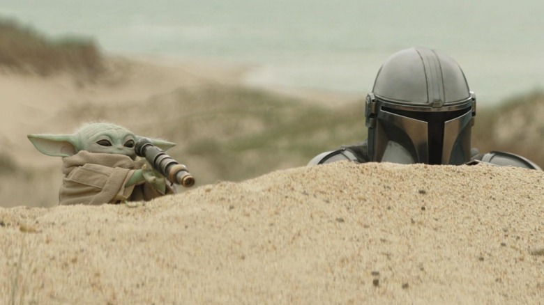 Grogu and The Mandalorian doing some scouting in Star Wars: The Mandalorian and Grogu (2026)