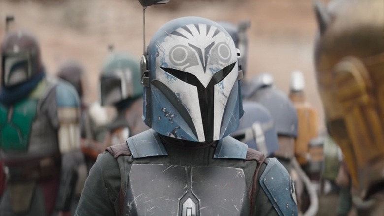 Bo-Katan talking to the Armorer 