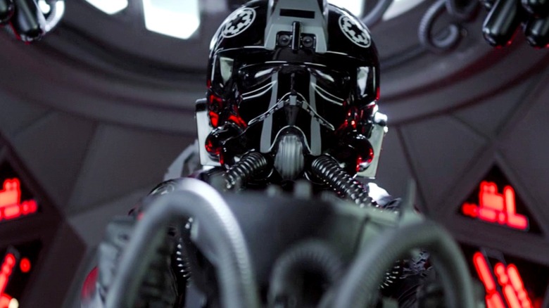 TIE pilot sitting in cockpit