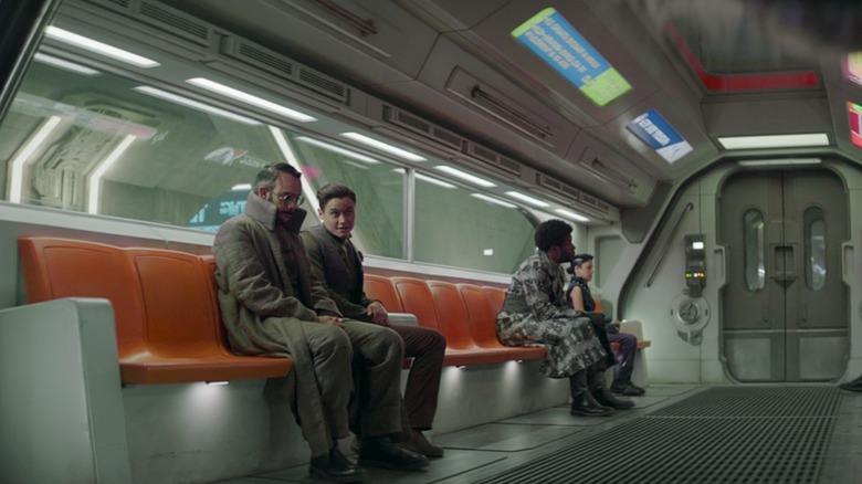Pershing and Elia ride the train