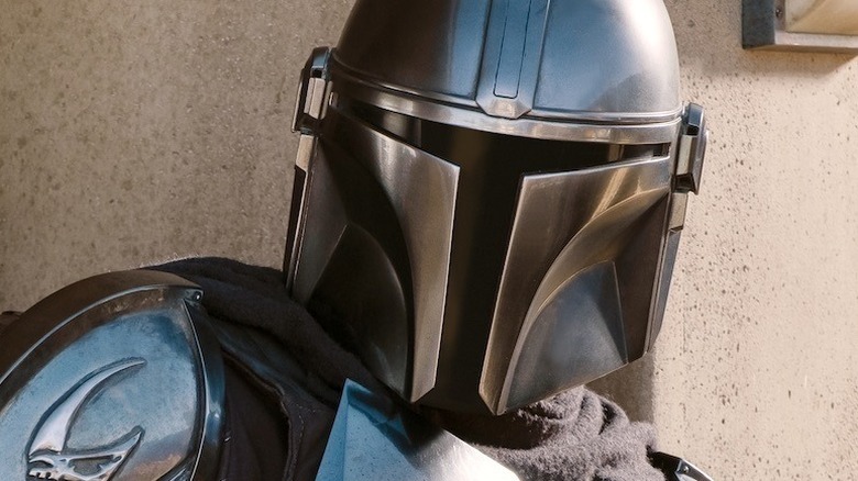 The Mandalorian staring